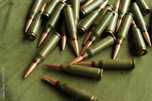 Bullets on green background 