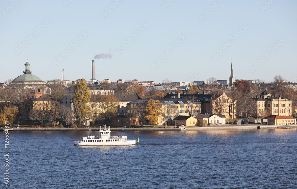 The beautiful Skeppsholmen and a ferry in central Stockholm