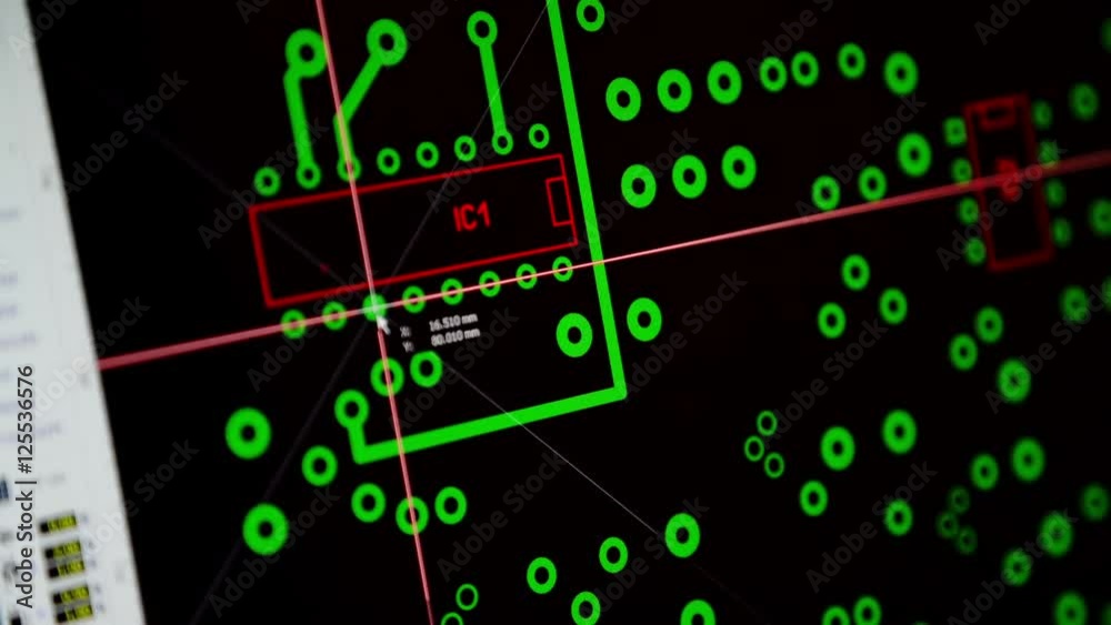 electronic engineer designing a printed circuit board with PCB layout software
