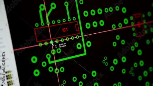 electronic engineer designing a printed circuit board with PCB layout software