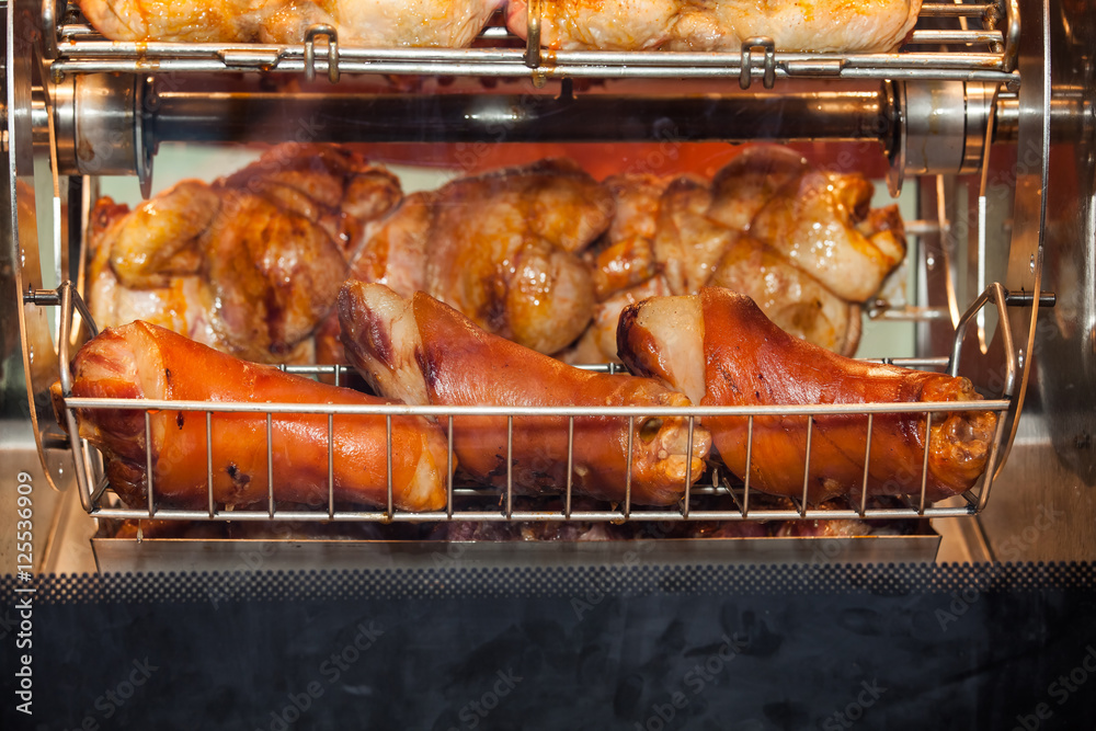 Grilled chicken in oven close up view Grilled chicken in oven close up view