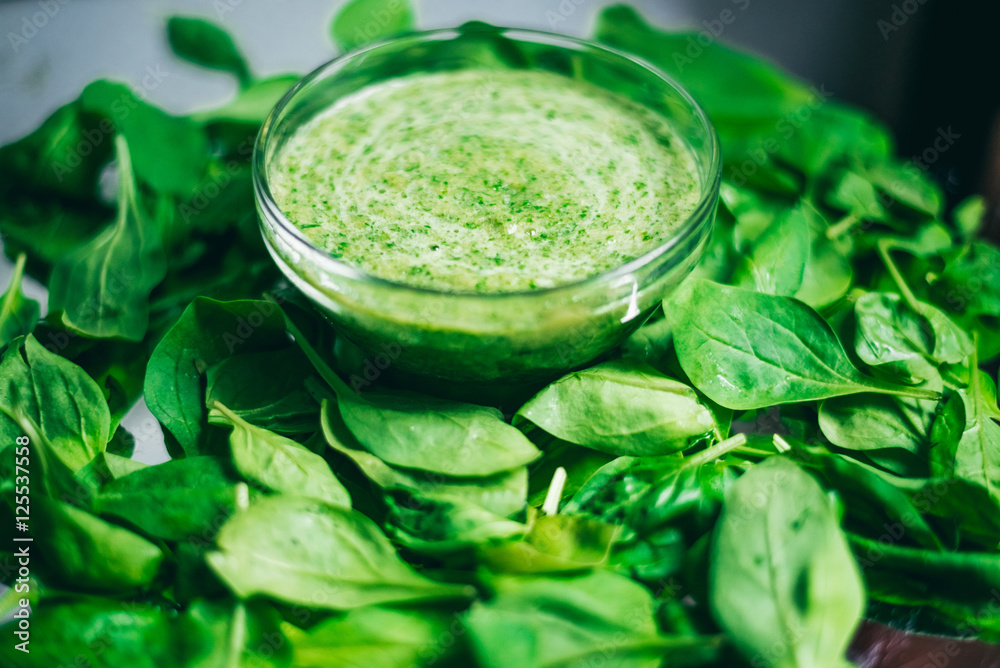 Fresh green juice smoothie made with organic green fruits and vegetables. The texture of the leaves. The concept of a healthy lifestyle Fresh green juice smoothie made with organic green fruits and vegetables. The texture of the leaves. The concept of a healthy lifestyle