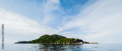 Tropical caribbean island in open ocean photo
