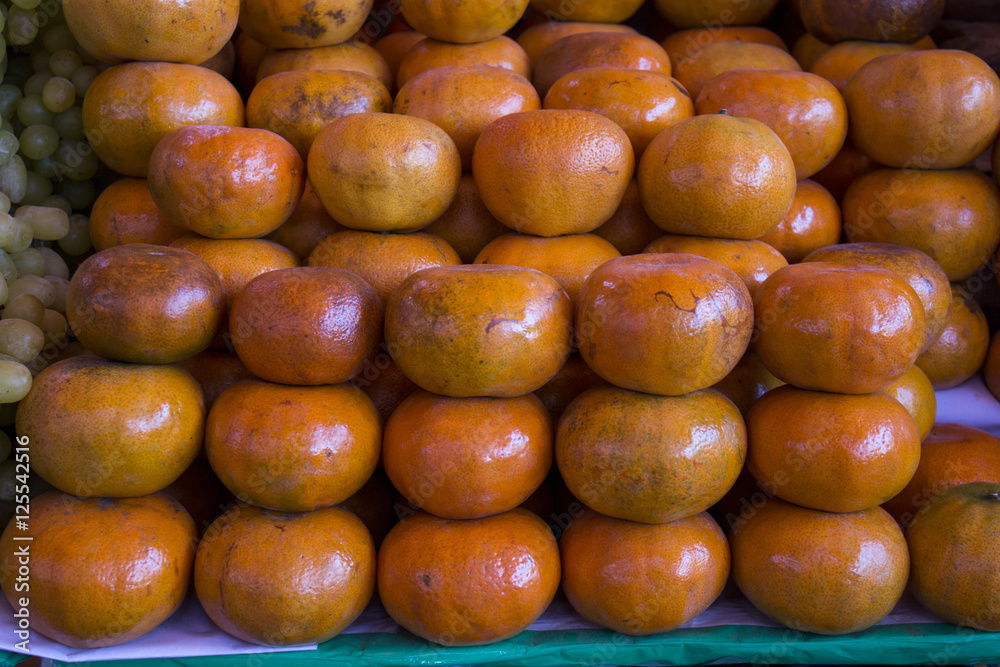 Delicious tangerines on the table on a market, Arequipa, Peru. 