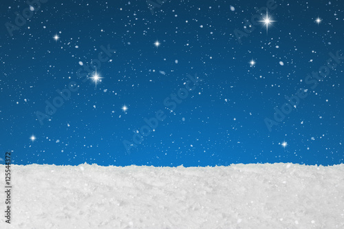 Christmas background concept showing snow falling and stars