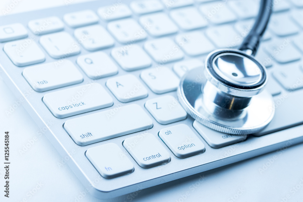 Stethoscope with a modern computer keyboard Stethoscope with a modern computer keyboard