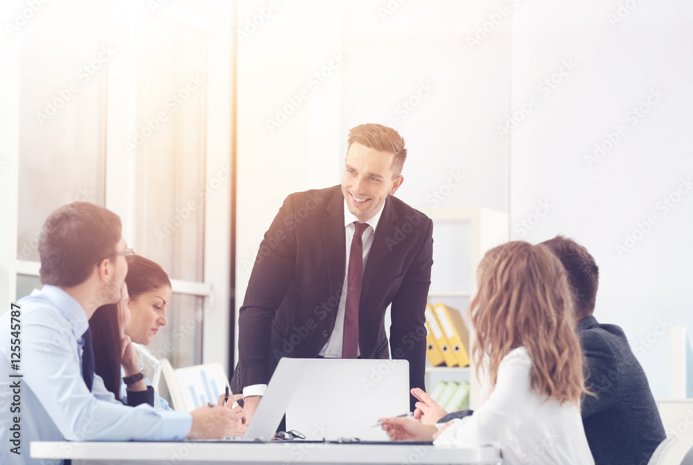 Group of business people in meeting at office Group of business people in meeting at office