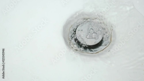The process of draining water in the bathroom
