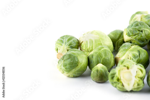 Fresh ripe brussels sprouts  on white 