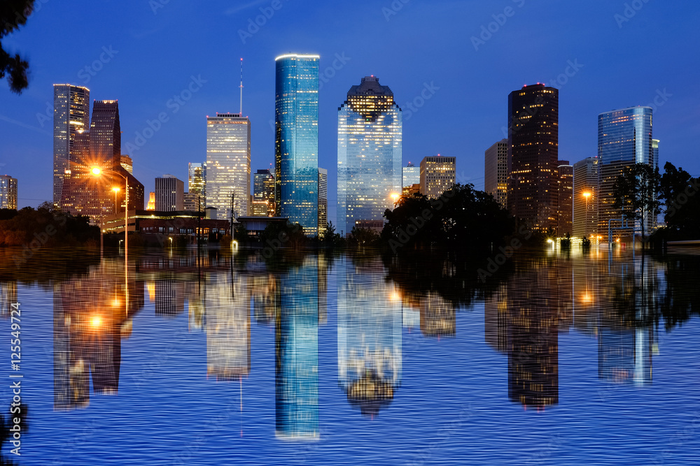 Reflection view of Downtown Houston city, Texas in a beautiful day at night