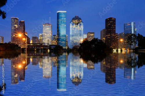 Reflection view of Downtown Houston city, Texas in a beautiful day at night