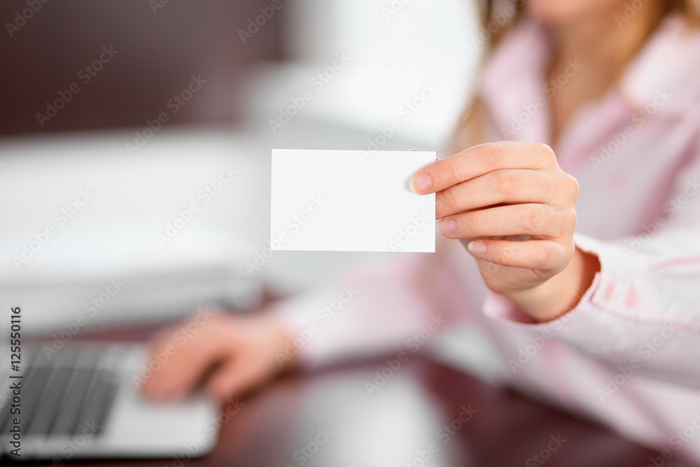 Business woman giving visit card Business woman giving visit card