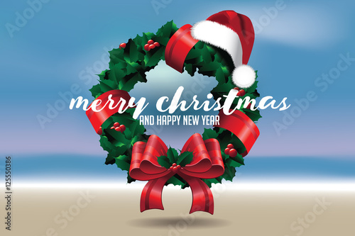 Merry Christmas from a tropical climate or from the beach. With Christmas wreath and Santa Claus hat.