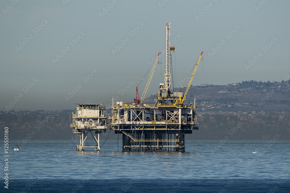 Pacific Ocean off-shore oil rig platform at California coast