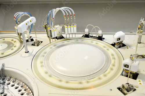 modern robotical machine for centrifuge blood and urine photo