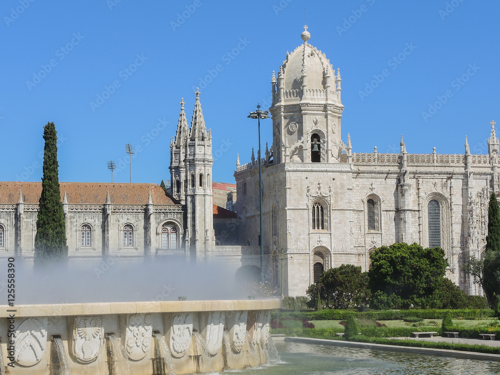 Lisbon, Portugal, Belem. Fountain named Luminosa and Gardens in front of Monastery named Jeronimos