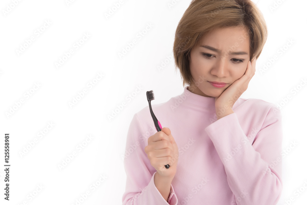 Asian woman toothache holding Toothbrush on white background. Asian woman toothache holding Toothbrush on white background.