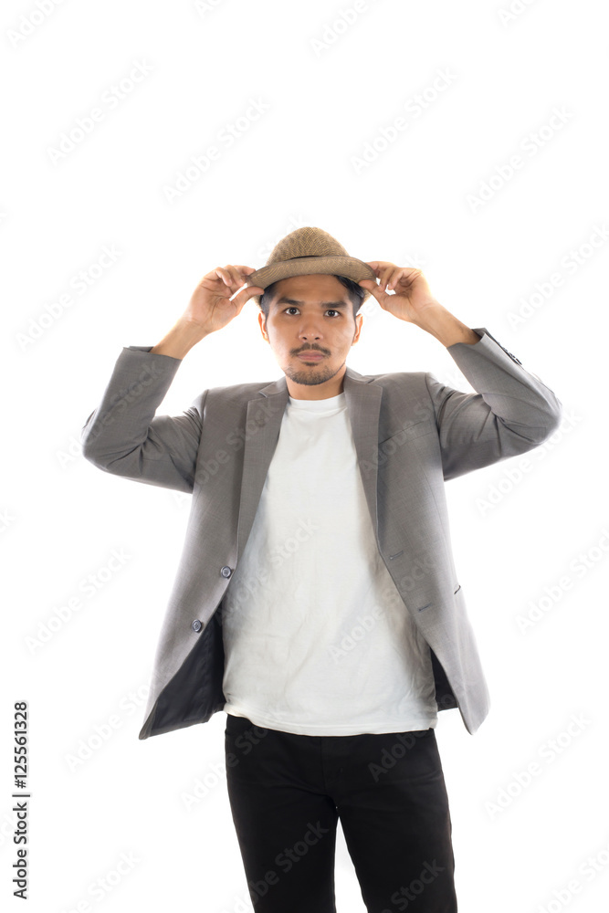 Portrait of young hipster man adjusting hat with head at camera Portrait of young hipster man adjusting hat with head at camera