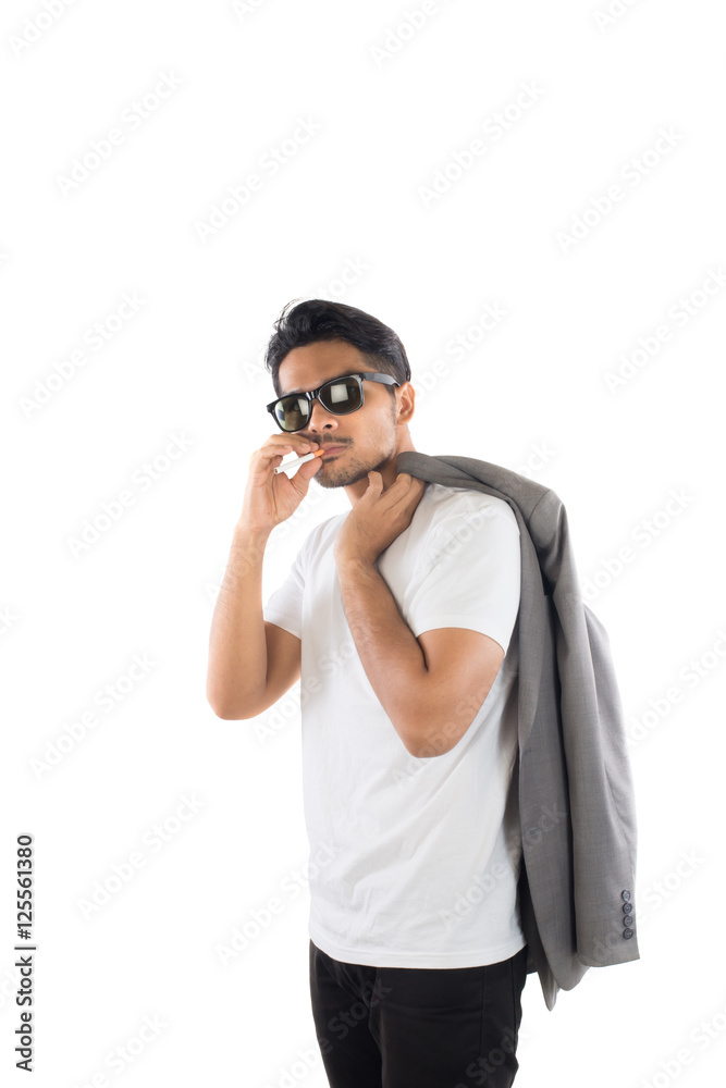 Young Business hipster man smoking a cigarette isolated on white Young Business hipster man smoking a cigarette isolated on white