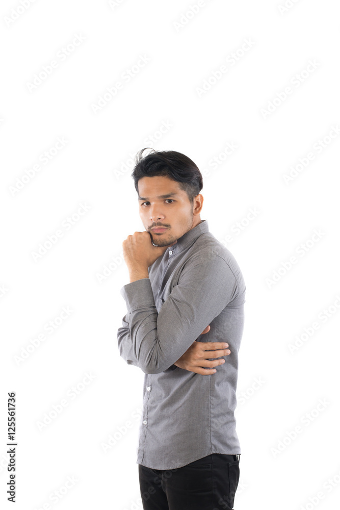 Handsome asian young hipster man standing at studio isolated on Handsome asian young hipster man standing at studio isolated on