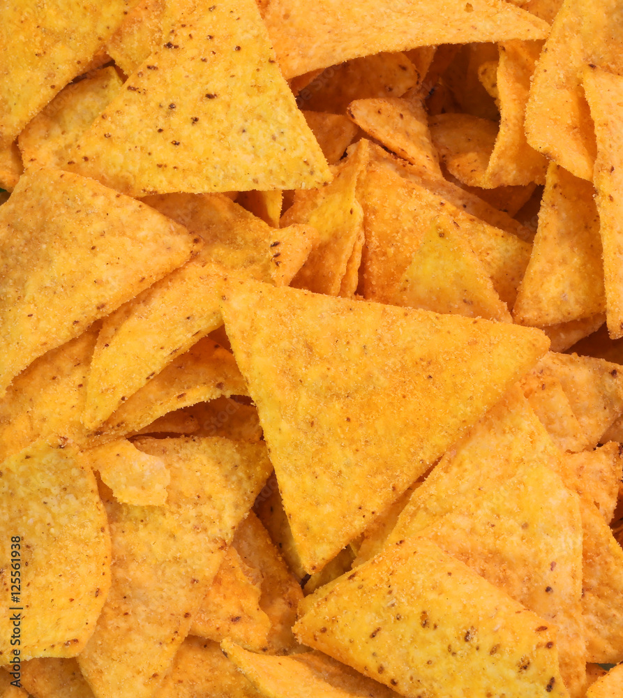 Mexican yellow tortillas chips with a lot of salt Mexican yellow tortillas chips with a lot of salt