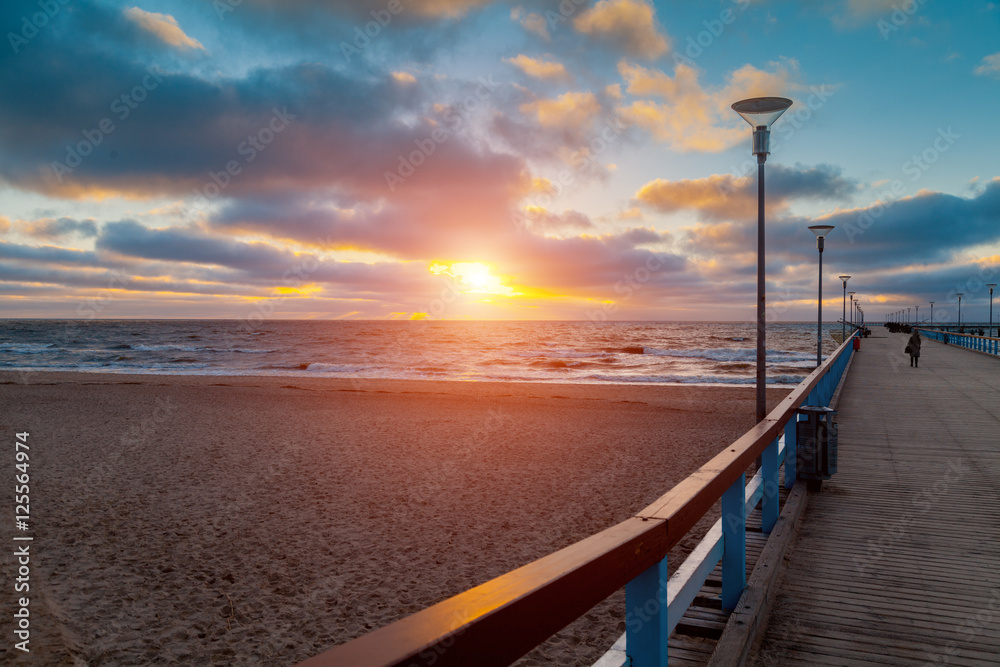 Sunset over the sea. Pier in Palanga, Lithuania