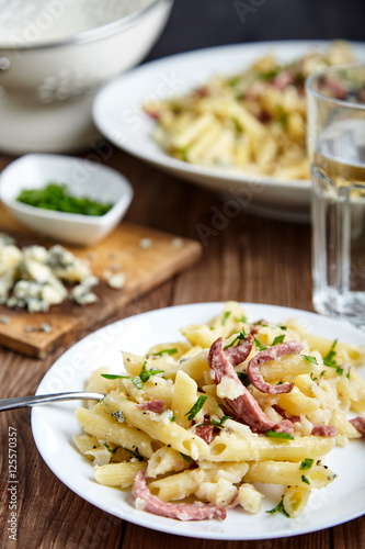 Pasta of Penne rigate, celery and smoked sausage