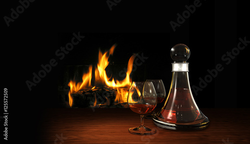 Stillleben mit Cognac am gemütlichen Kaminfeuer