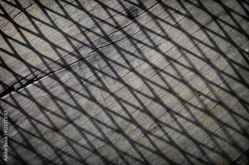 Shadow and line on wooden floor, abstract concept and pattern idea