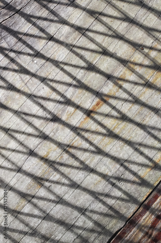 Shadow and line on wooden floor, abstract concept and pattern idea