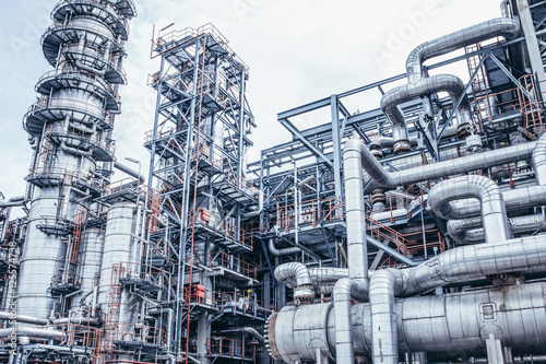 Industrial zone,The equipment of oil refining,Close-up of industrial pipelines of an oil-refinery plant,Detail of oil pipeline with valves in large oil refinery.
