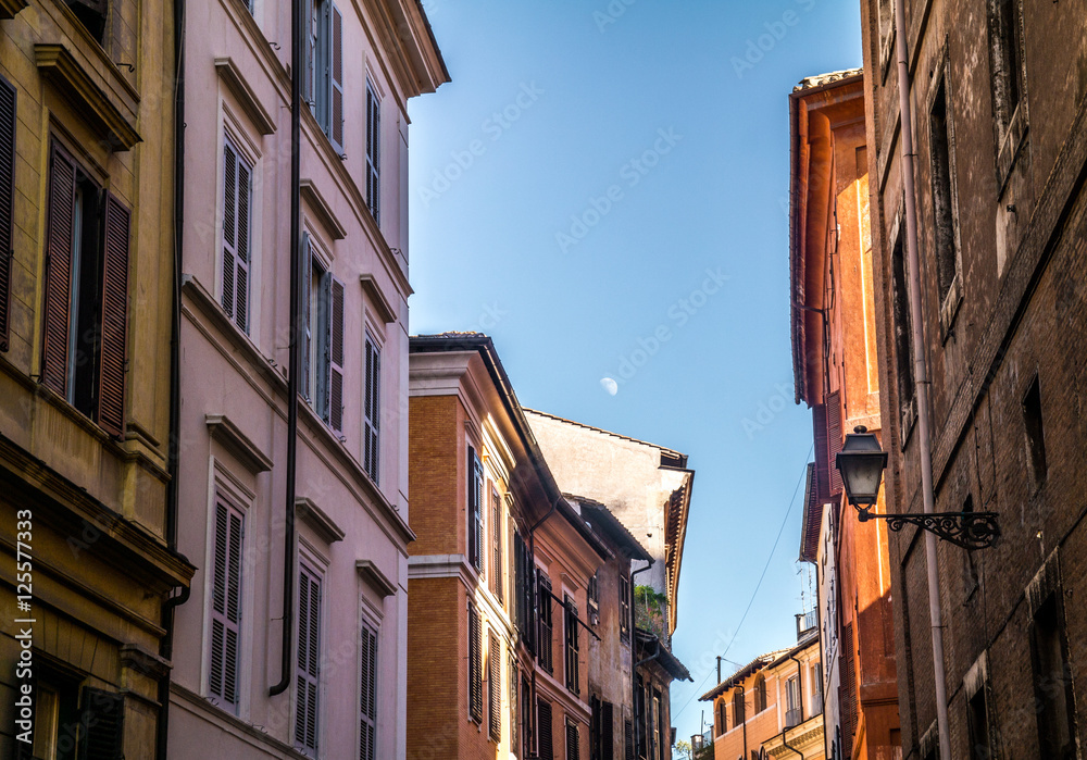 the sky behind houses in Rome