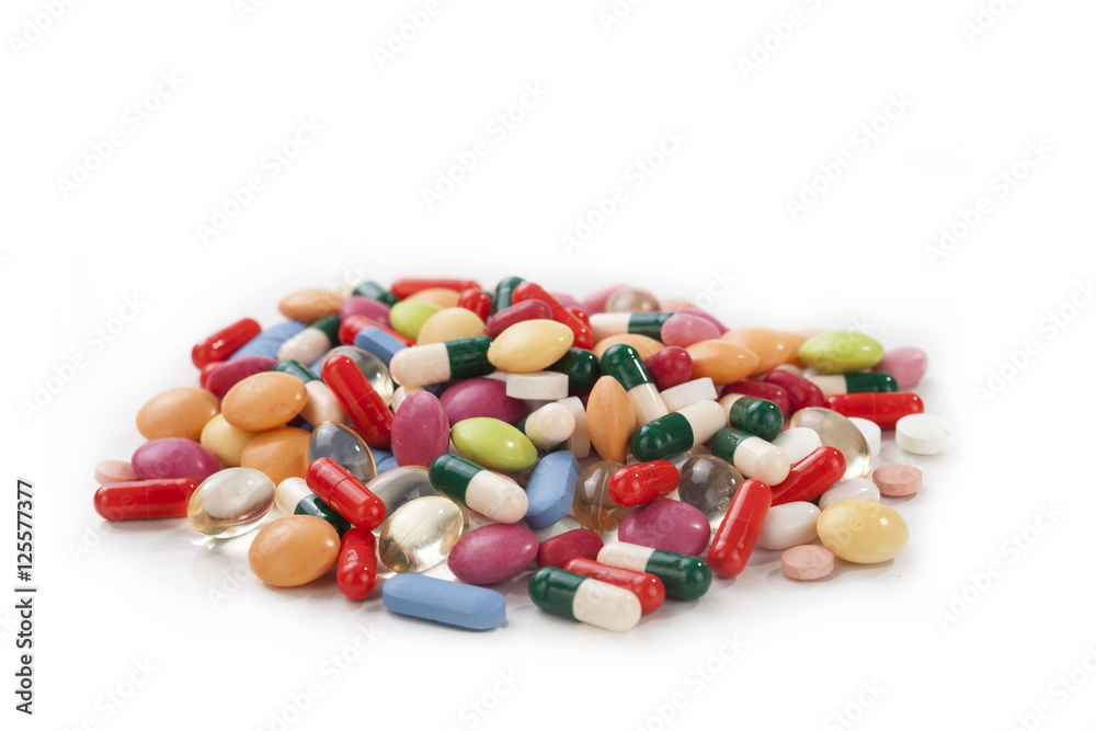 Many colorful pills isolated on white background Many colorful pills isolated on white background