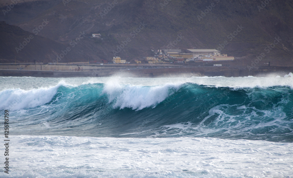 ocean wave breaking by Confital beach, north East of Gran Canari ocean wave breaking by Confital beach, north East of Gran Canari