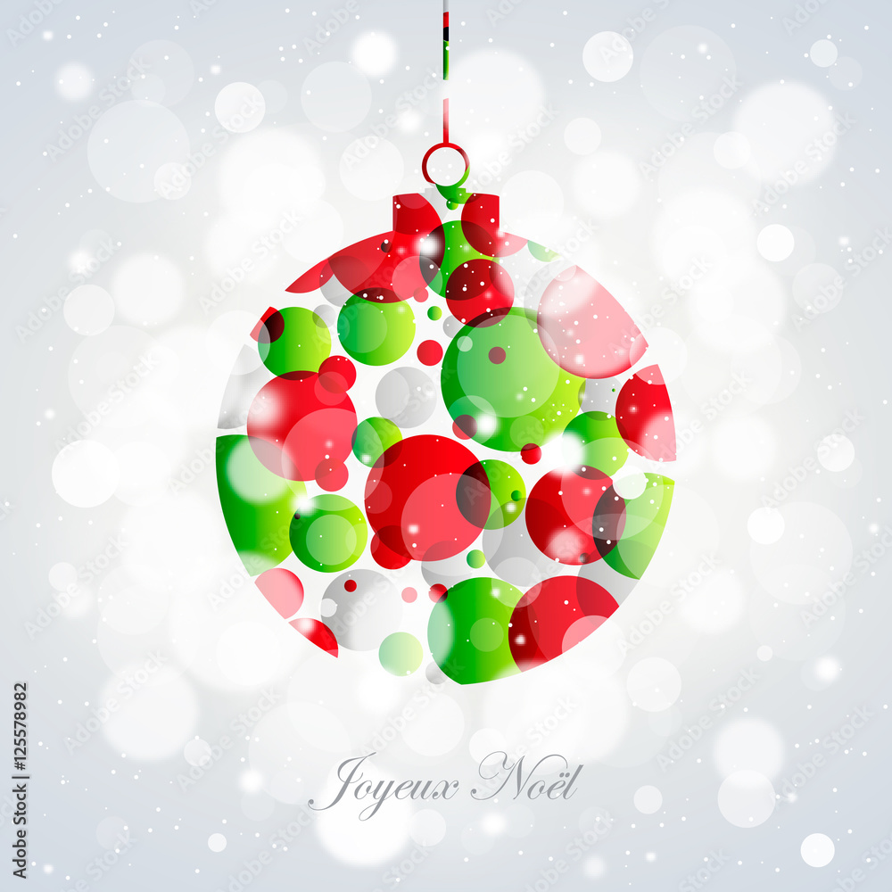Carte de vœux avec boule de Noël rouge et vert sur bokeh