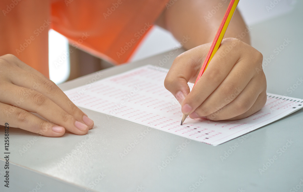 Thai student testing in exercise, exams answer sheets with penci Thai student testing in exercise, exams answer sheets with penci
