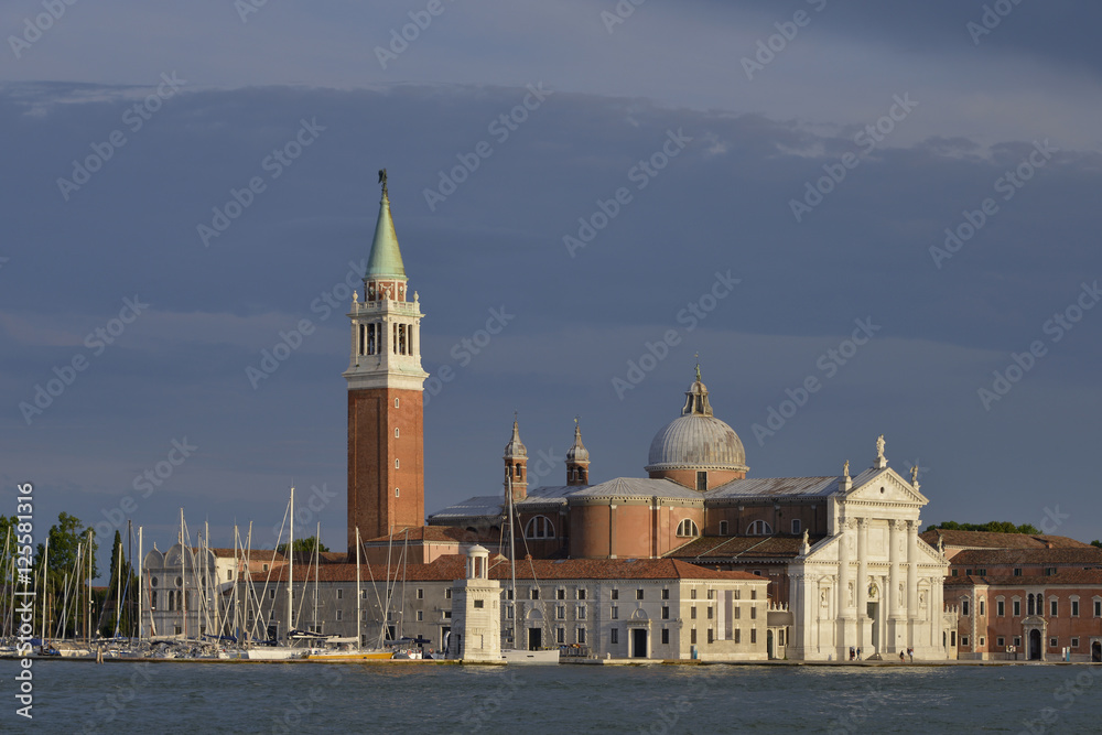 Basilica of San Giorgio Maggiore and the port in Venice, a famous city in northeastern Italy and the capital of the Veneto region