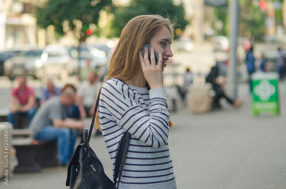 Young woman using her phone