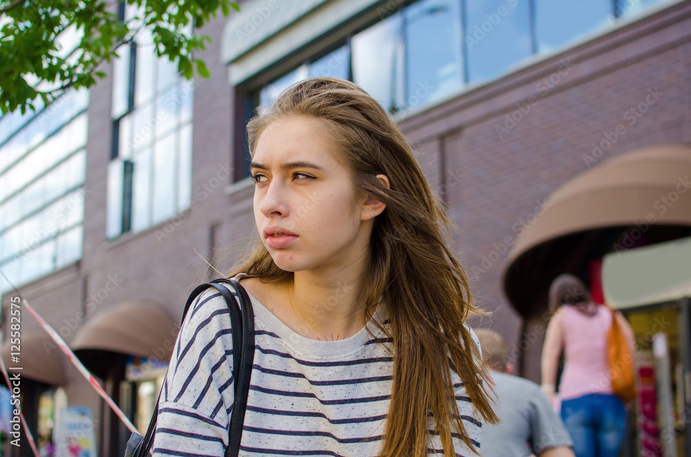 Fotografie Young woman walking and resting