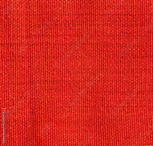 Natural background of thick light orange red patterned fabric. Fabric texture  for background. 