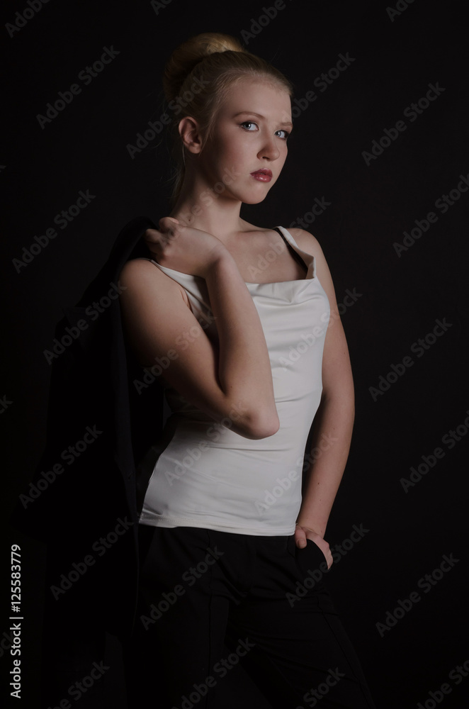 Beautiful blonde woman in a severe business suit Beautiful blonde woman in a severe business suit