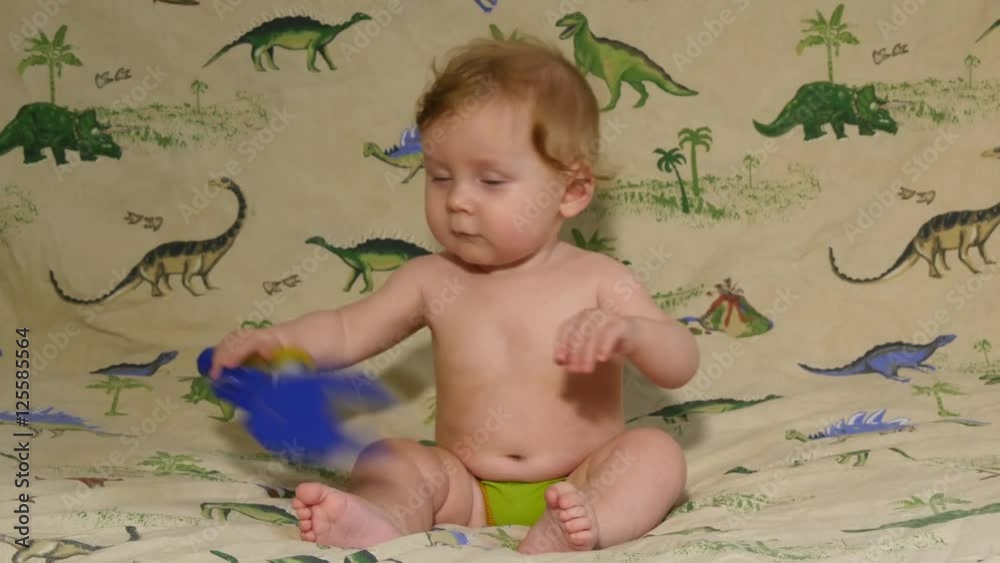 Handsome little boy playing with the microscope Handsome little boy playing with the microscope