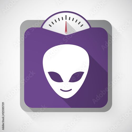 Long shadow weight scale with an alien face
