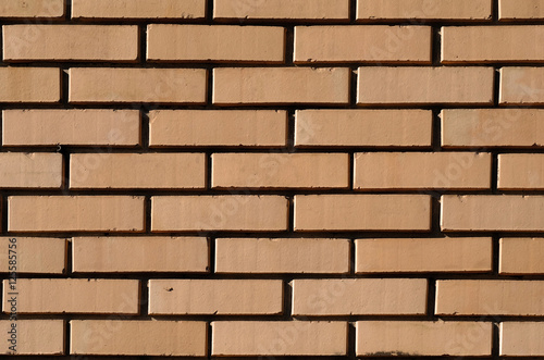 Cream yellow brick wall texture