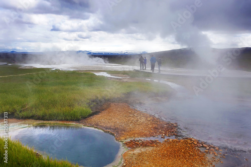 Hot steam over the source of the thermal waters, Hveravellir, Iceland. White nights in Iceland.