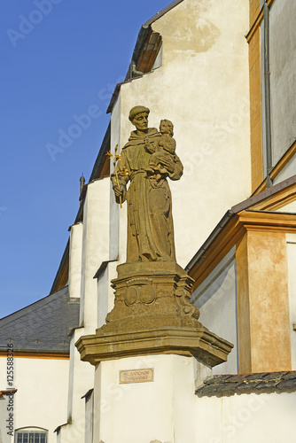 Hustopece nad Becvou - The parish church of the Holy Cross. Statues around the church has a rare set of Baroque architecture in Moravia. Czech republic photo