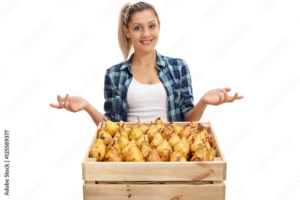 Female farmer posing with crate and gesturing with hands Female farmer posing with crate and gesturing with hands