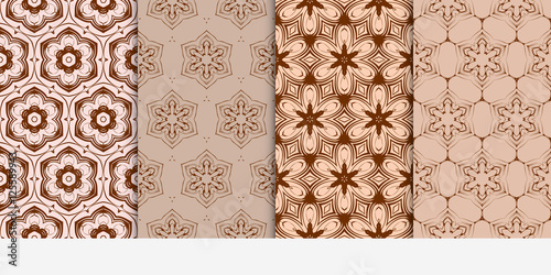 set of 4 geometry seamless pattern. Abstract geometric flower on brown background. Ethnic ornament. vector