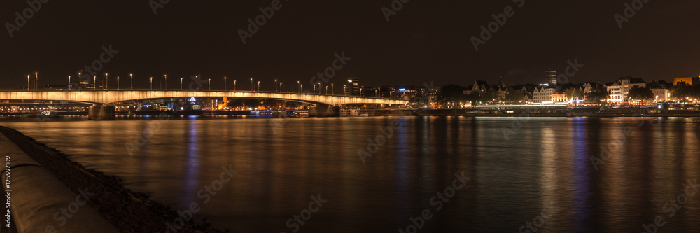 Illuminated bridge of Deutz by night, Cologne, Germany