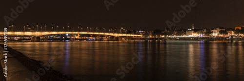 Illuminated bridge of Deutz by night, Cologne, Germany